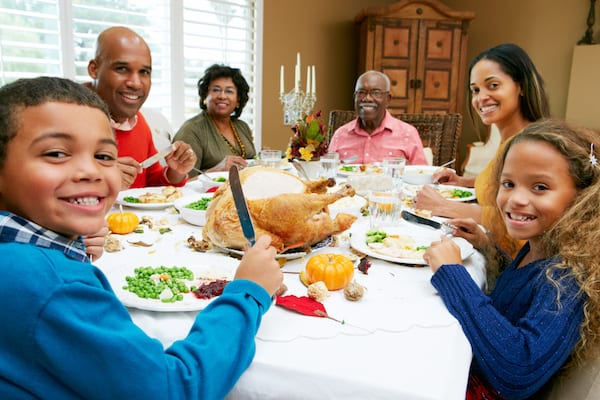 Family enjoying Thanksgiving dinner together